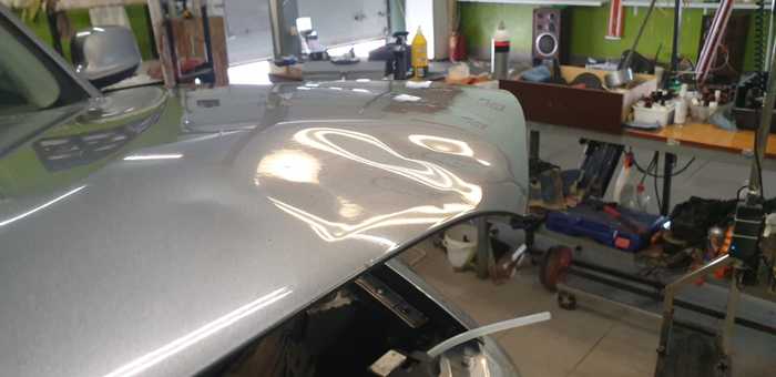 Вмятина на капоте